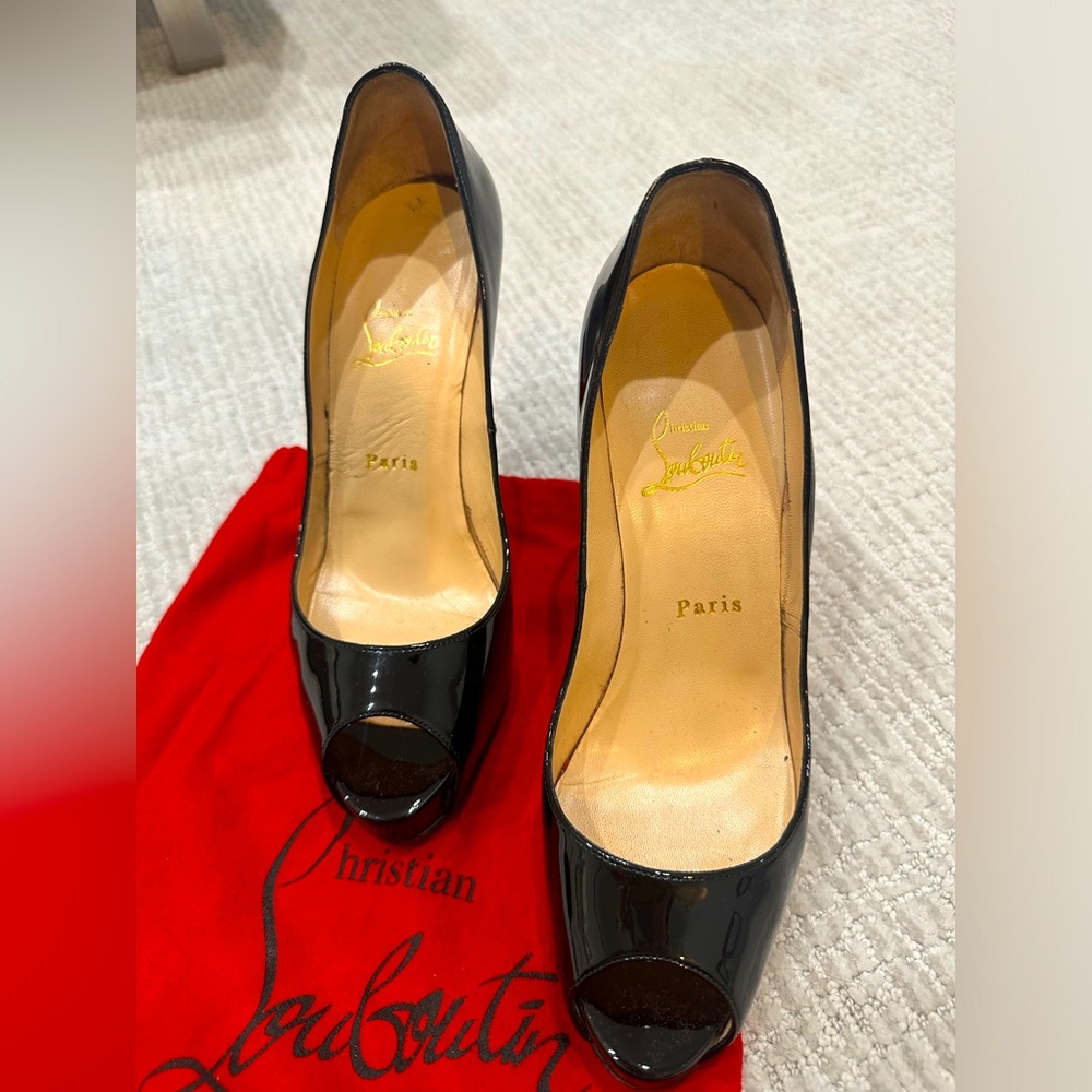 Christian Louboutin heels in GREAT condition.